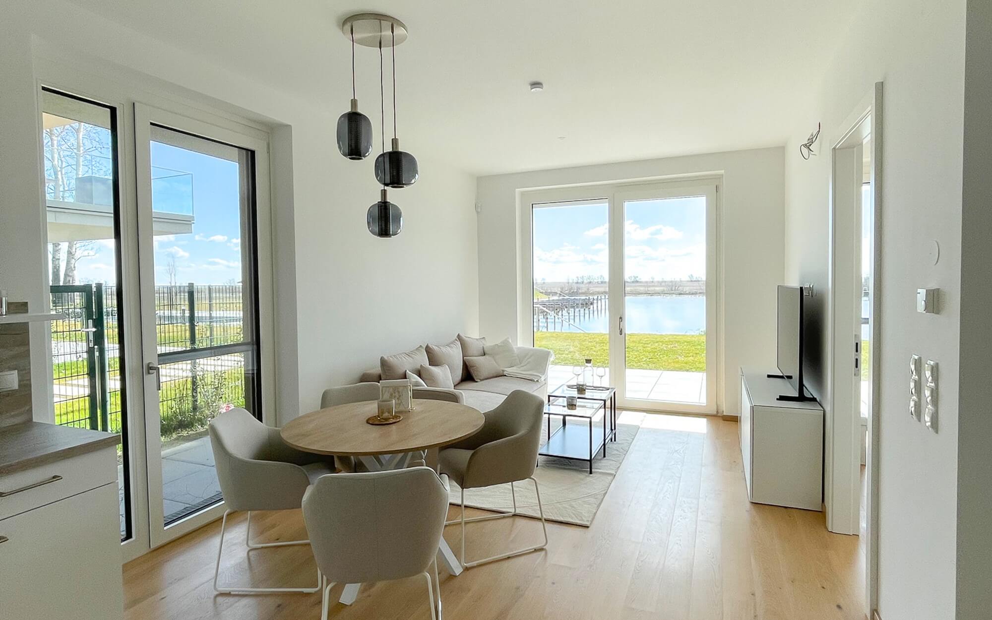 FEREIENWOHNUNG MIETEN SEEPARK OGGAU WOHNZIMMER